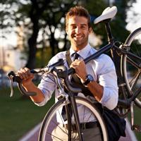 Businessman cycling to work