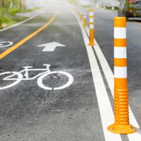 Flexible traffic bollard in bike lane