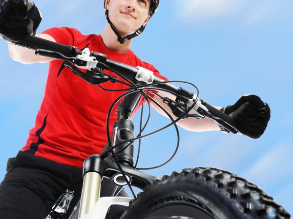 Cyclist wearing helmet