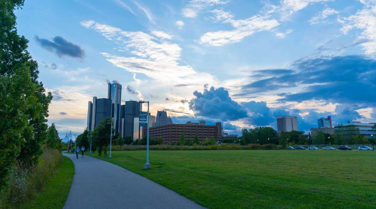 Detroit, MI - September 7, 2019: Detroit Riverfront bike path leading to the heart of downtown